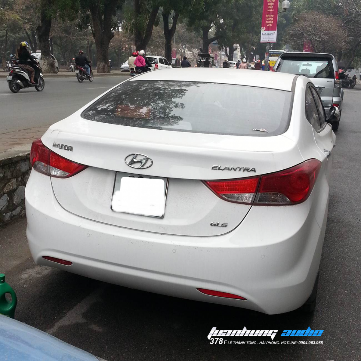 Hình ảnh dán phim cách nhiệt llumar tai o to tuan hung