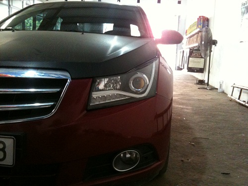 Đèn pha độ laceti 2010(CRUZE) kiểu AUDI